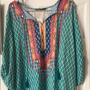Bohemian dress.. NWT size says 2x but fits like a large..ruching on the sleeves